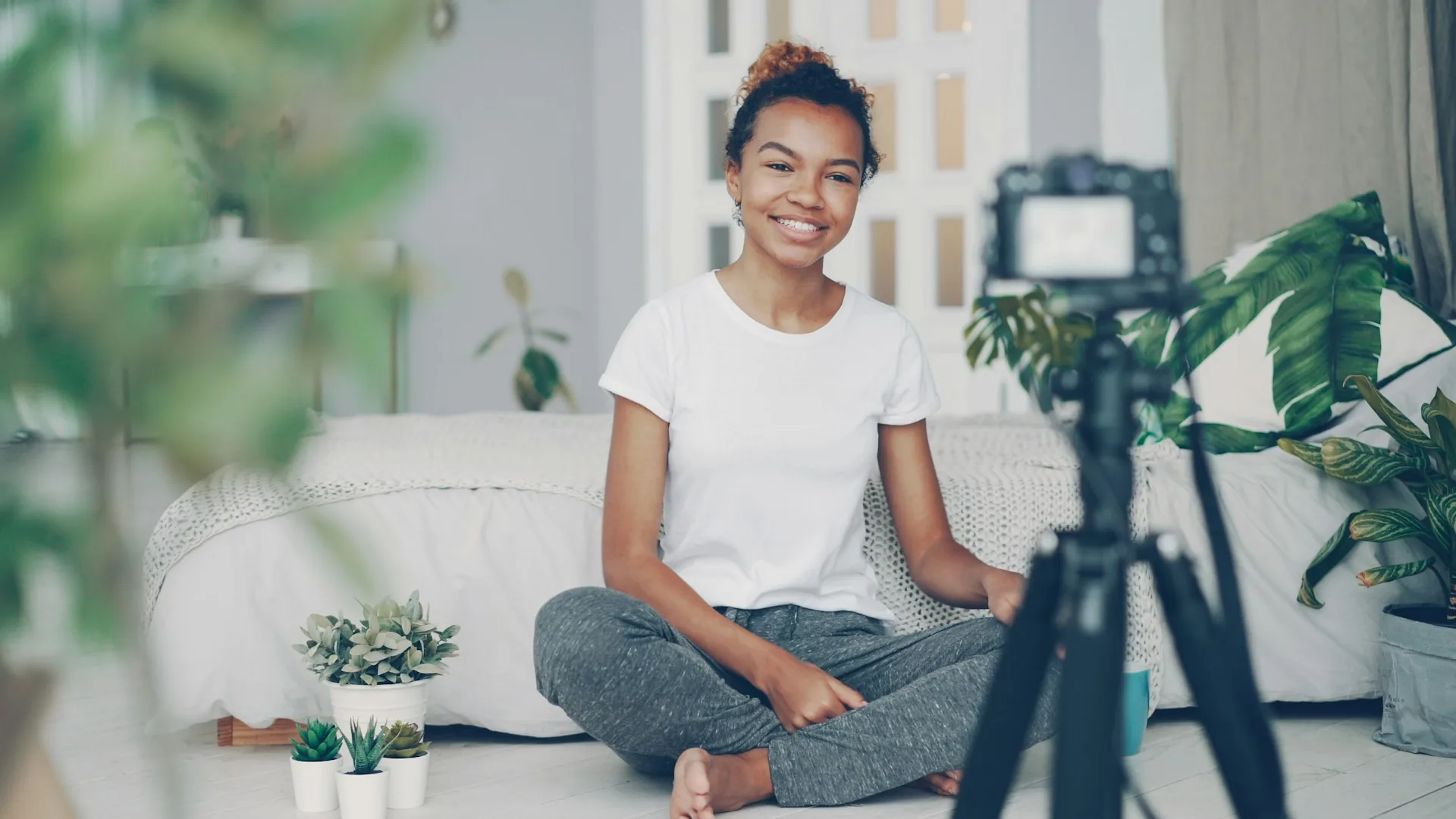 Content creator recording a video for her personal brand in a studio