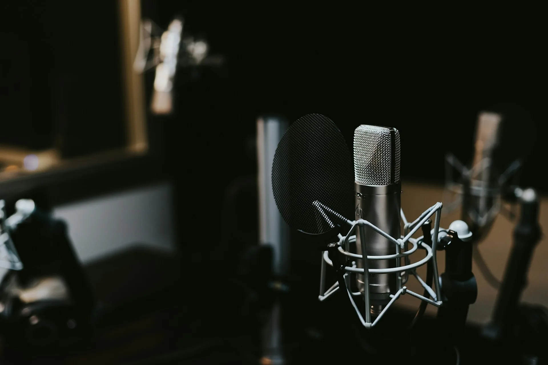 Condenser microphone in a podcast recording studio