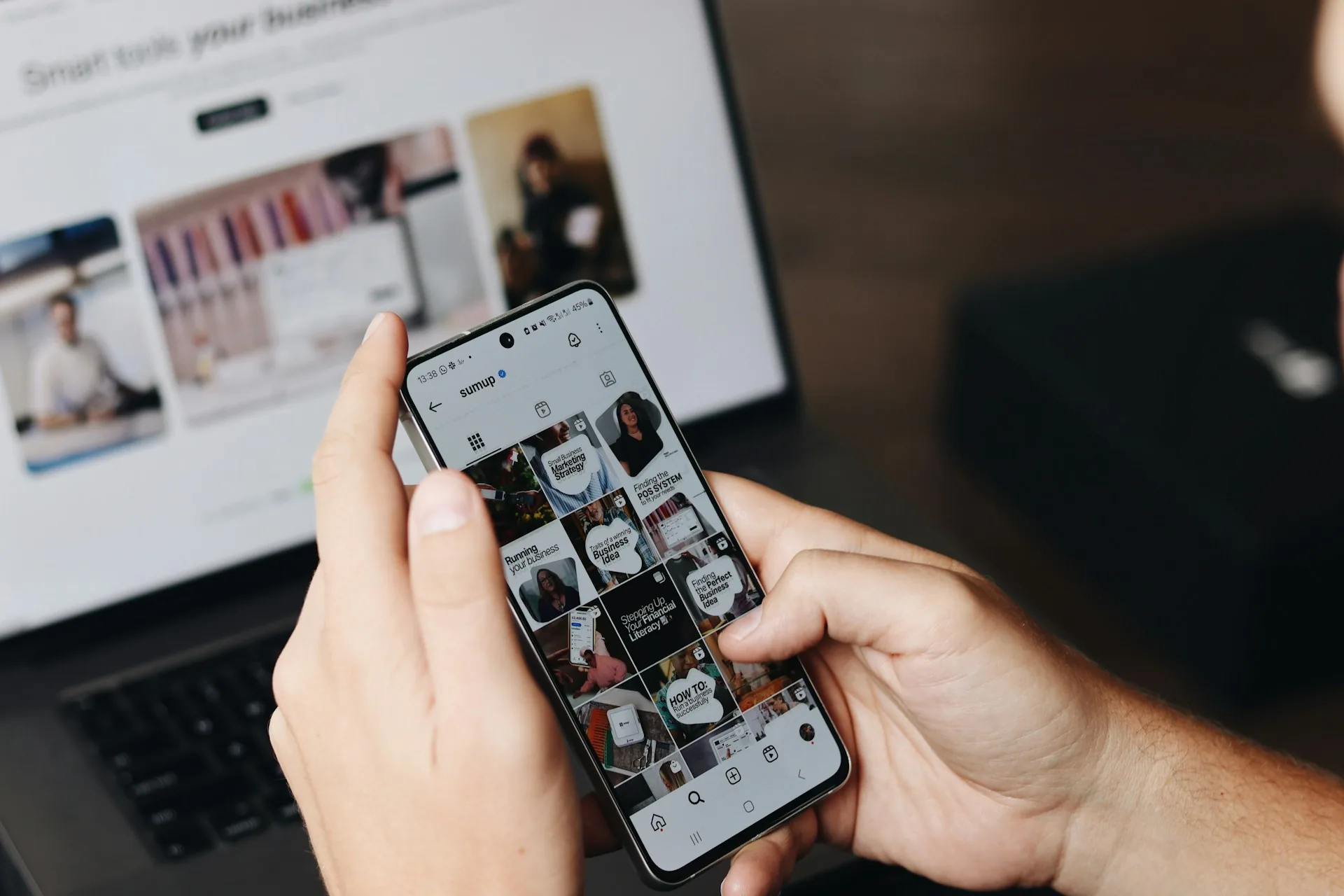 Person editing social media clips on a smartphone and computer